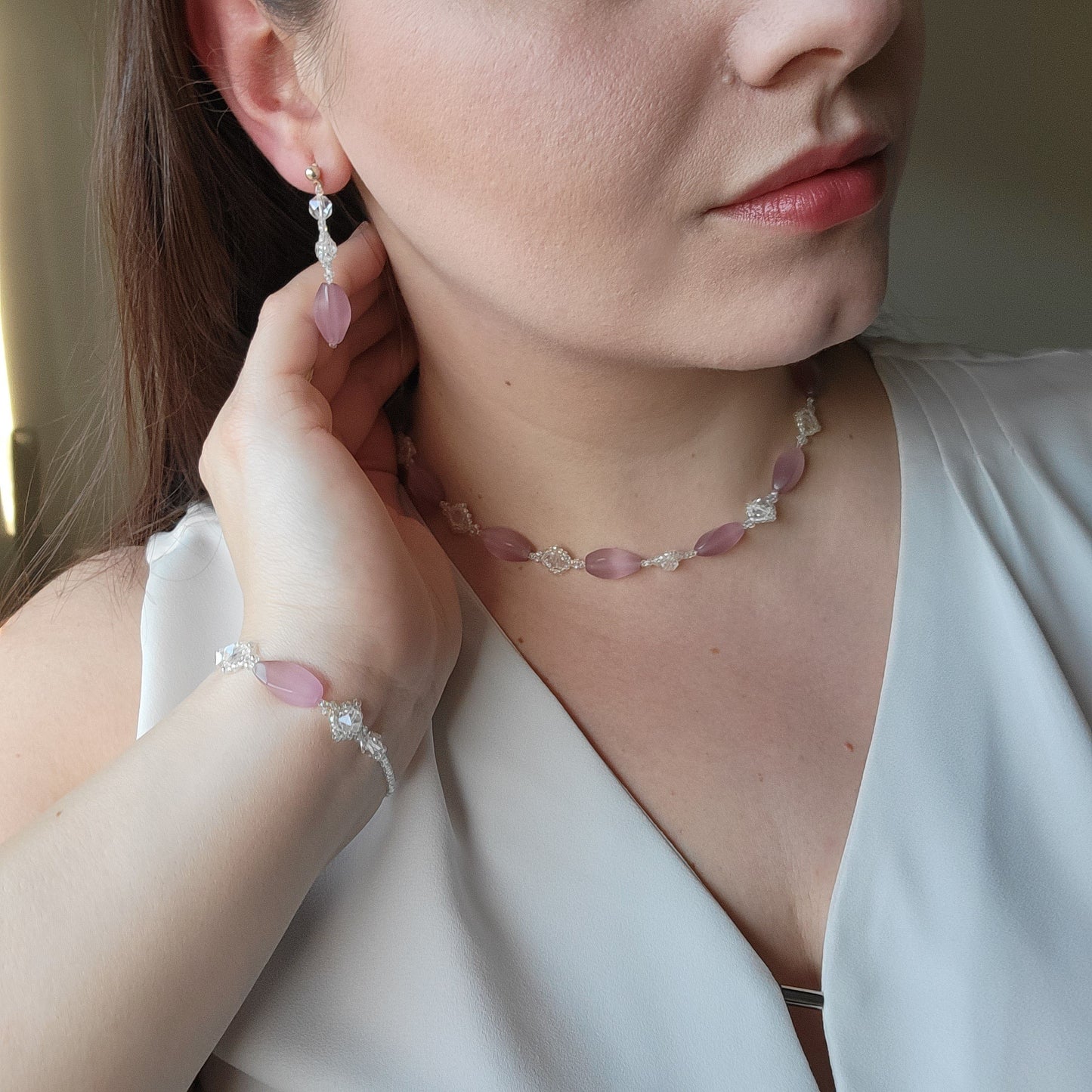 Picture 5 of 5 showing Pink Cateye Necklace, Bracelet and earrings lifestyle shot model wearing it.