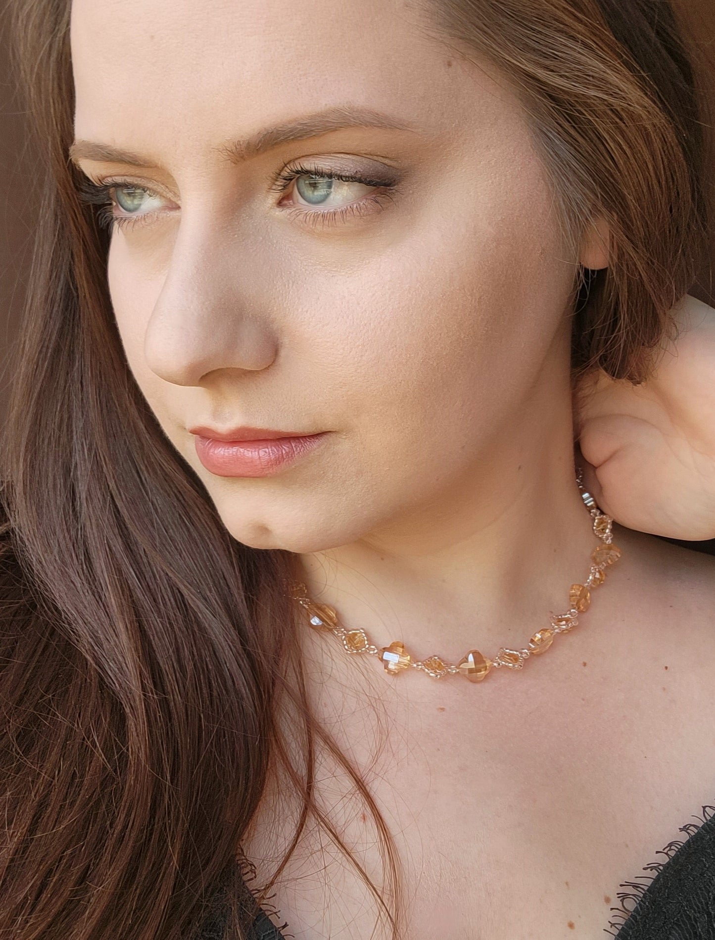 Picture 3 of 5 showing Krystal Necklace in Golden Aurica model wearing shot wearing the product