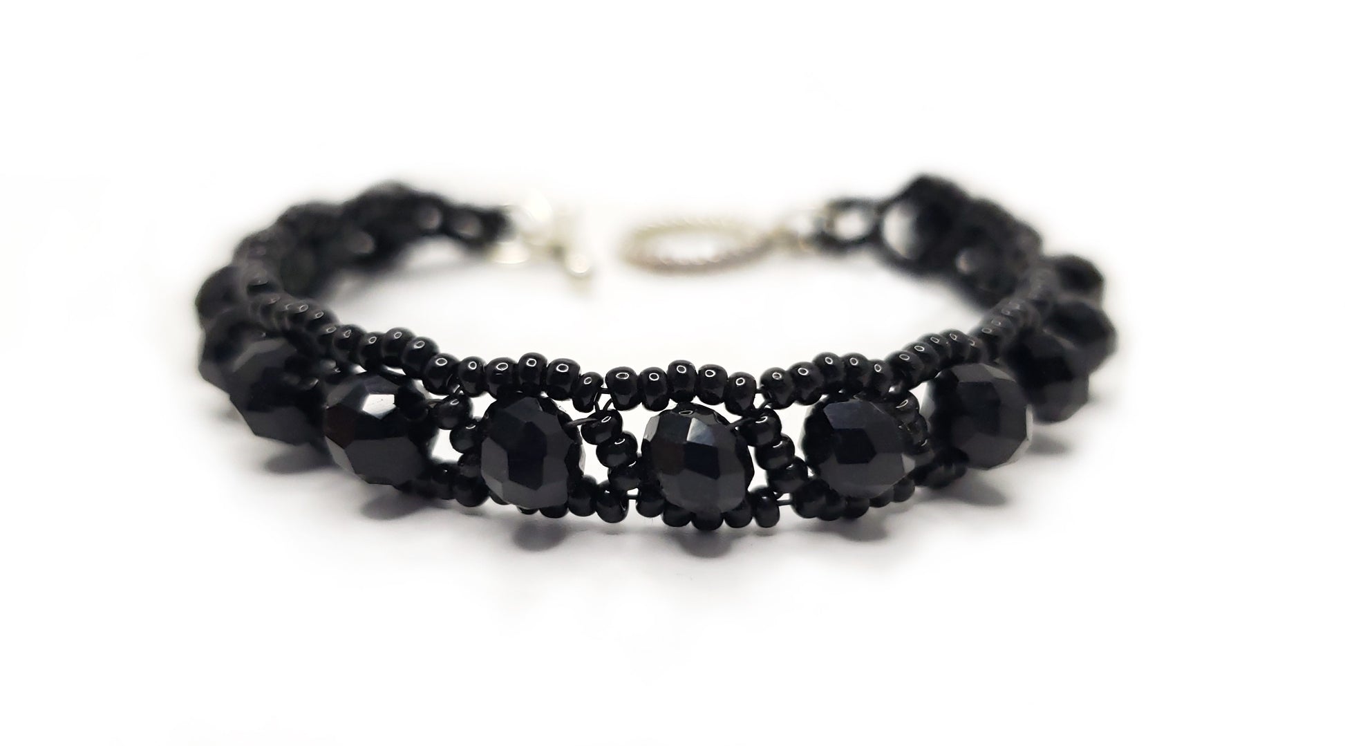 Picture 1 of 3 for Esses Bracelet in Black Illumina - Product Close up shot on white background - Version A