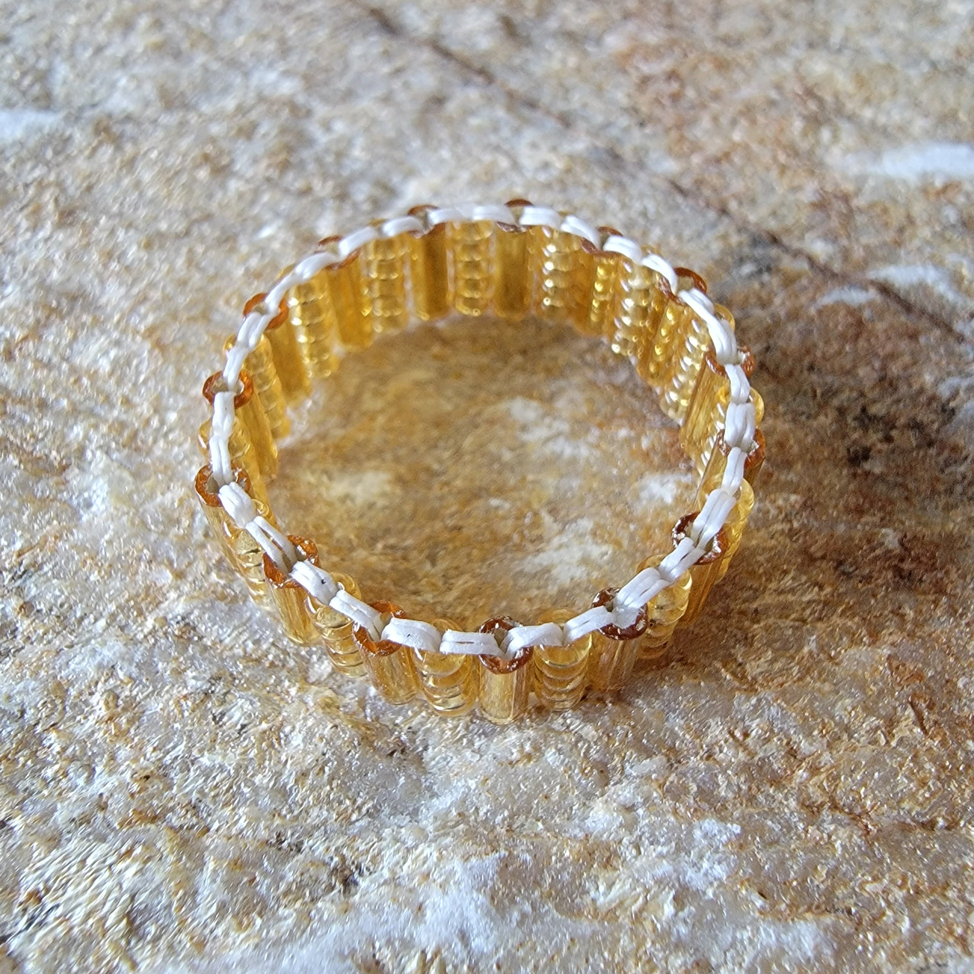 Picture of 2 of 3 of Goddess Ring in Gleaming Gold product shot top view